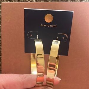 Beautiful brand new statement gold earring hoops!